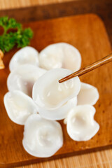 High Quality Fresh Jade Fungus Mushrooms from Changbai Mountain Northeast China on Wooden Board