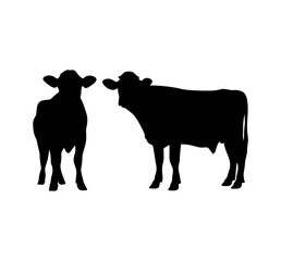 Two black silhouettes of cows standing together on a white background