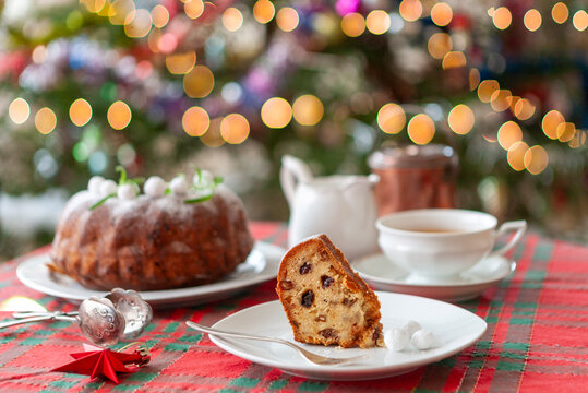 Christmas fruitcake on Christmas tree background