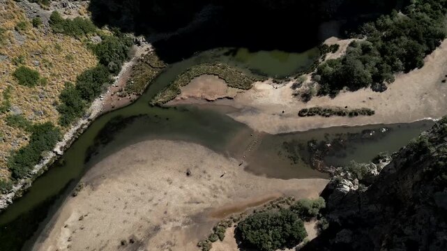 90 degrees aerial view Torrent de Pareis in a sunny day. Sa calobra beach. Video 4K