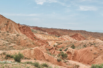 Fairy Tale canyon or Skazka canyon, Kyrgyzstan. Red sandstone and wind-sculpted landscape