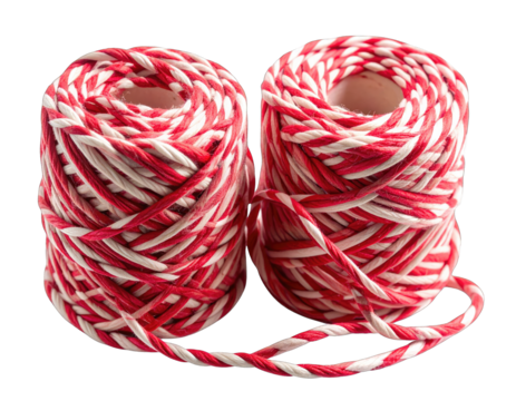 Two spools of red and white twisted twine string for crafts and gifts. - Powered by Adobe