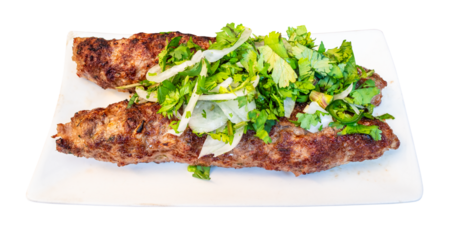 Georgian meat kebab on white plate cut out