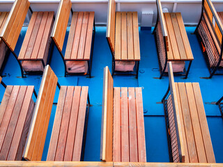 empty wooden benches on board of tour boat