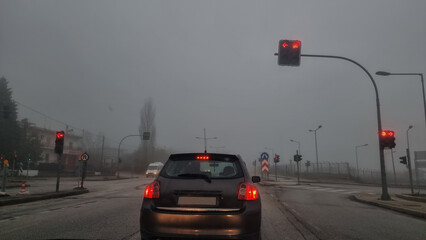 fog road lights car in autumn travel