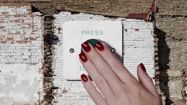 wall and hand pressing large exit button