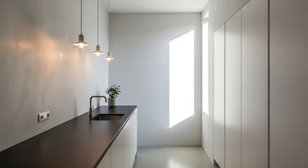 Modern Minimalist Kitchen with Sleek Countertop and Pendant Lights.
