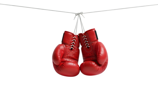 Red boxing gloves hanging on a string, ready for a fight
