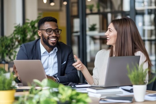 Diverse colleagues collaborating on a financial project in a modern office. Professional photo ideal for corporate use and marketing materials.