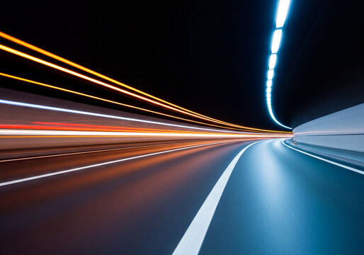 Light trails in a dark tunnel with blue and orange streaks Keywords: light trails, tunnel, dark
