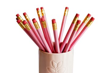 Vibrant pink pencils with gold erasers arranged in a stylish ceramic cup, perfect for creative projects and office organization needs.