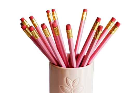 Vibrant pink pencils with gold erasers arranged in a stylish ceramic cup, perfect for creative projects and office organization needs.