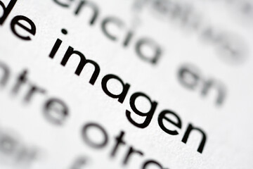 Close-up view of the Spanish word imagen on printed text