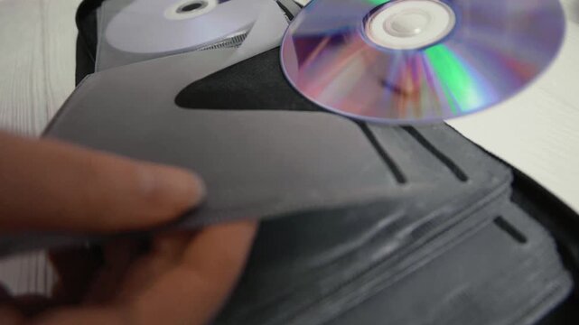 Close up of cd discs in a holder. Disc with data,movie or music.