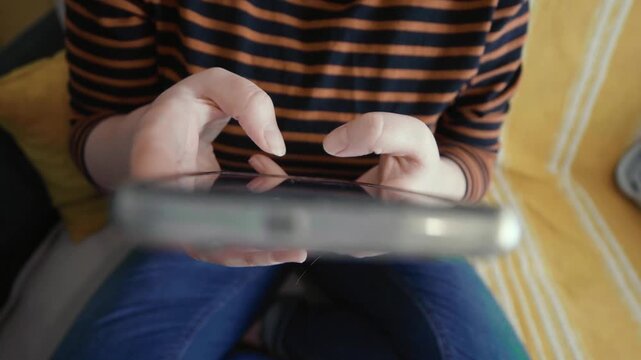 Woman endlessly scrolling social media.
