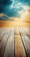 Old wooden floorboards meet a dramatic sky with clouds.