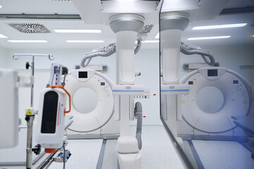 Advanced medical imaging equipment in a modern hospital room during the day
