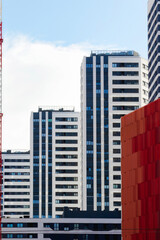 Modern high-rise buildings in Bilbao against blue sky