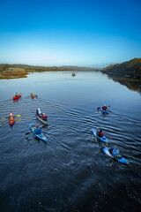 Kayakers on the river Axe near town of Seaton in Eat Devon, England