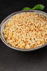 Orecchiette small pasta drum wheat pasta Italian food tasty snack fresh delicious gourmet food table setting rustic top view copy space
