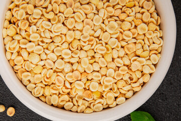 Orecchiette small pasta drum wheat pasta Italian food tasty snack fresh delicious gourmet food table setting rustic top view copy space