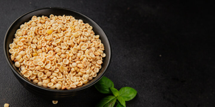 Orecchiette small pasta drum wheat pasta Italian food tasty snack fresh delicious gourmet food table setting rustic top view copy space