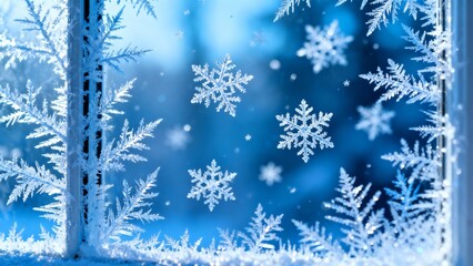 Blue winter background with frosty window pattern and snowflakes. Cold season concept.