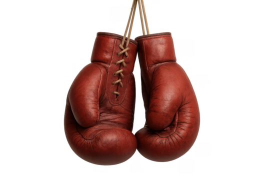 Vintage boxing gloves hanging, symbolizing retirement, end of a fight, combat sports, or a challenge