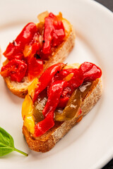 Bruschetta roasted pepper vegetable dish natural product tasty snack fresh delicious gourmet food background on the table rustic top view copy space vegan and vegan food