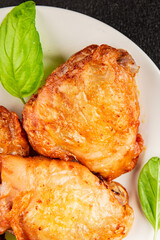 Chicken thighs fried poultry meat dish natural product tasty snack fresh delicious gourmet food background on the table rustic top view copy space