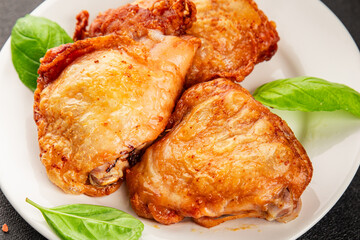 Chicken thighs fried poultry meat dish natural product tasty snack fresh delicious gourmet food background on the table rustic top view copy space