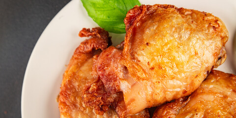 Chicken thighs fried poultry meat dish natural product tasty snack fresh delicious gourmet food background on the table rustic top view copy space
