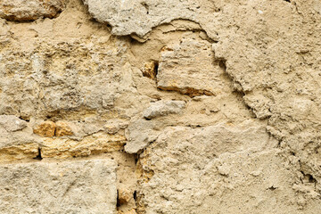 Texture of old stone wall as background, closeup