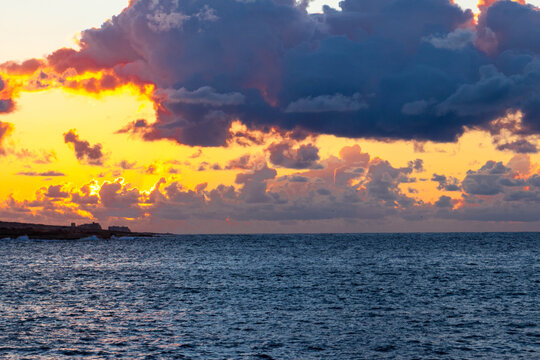 Beautiful sunset sky over sea.