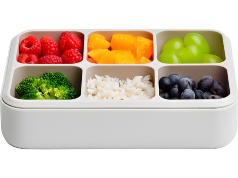 Modern bento-style lunchbox with fruits and vegetables isolated on transparent background, perfect for healthy lifestyle visuals.