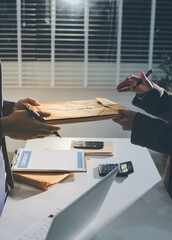 Lawyer explained to the client about the law that must be brought against the court case.