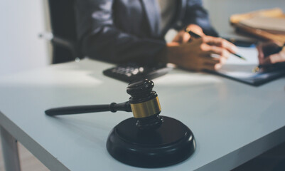 Lawyer explained to the client about the law that must be brought against the court case.