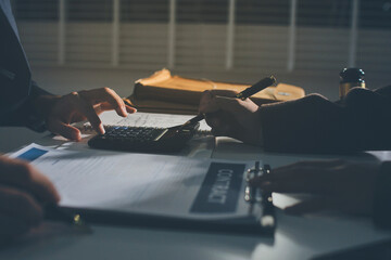 Lawyer explained to the client about the law that must be brought against the court case.