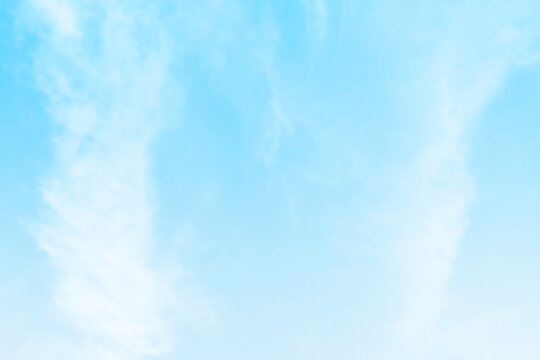 Blue pastel sky with white fluffy cloud. Cumulus clouds background. Cloudscape morning sky. The concepts of freedom of life, never give up and positive though energy.