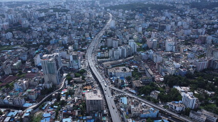 Chattogram city skyline at dusk, Bangladesh, showing modern buildings, glowing lights, and the vibrant atmosphere of the port city.