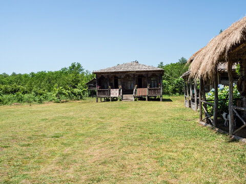 shabby wooden houses in georgian village in summer