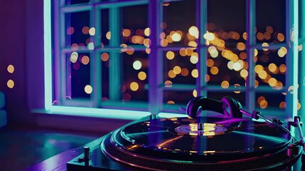 In this enchanting video, a record player spins softly under vibrant neon lights. The view through the window reveals a city alive with twinkling lights, creating a relaxing ambiance. - Powered by Adobe