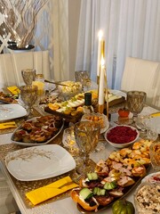 Autumn Thanksgiving table with snacks and candles
