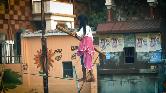 Circus Performer Balancing on Rope in Mathura Street