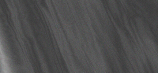 Obraz premium Abstract dark gray texture background with subtle wavy lines