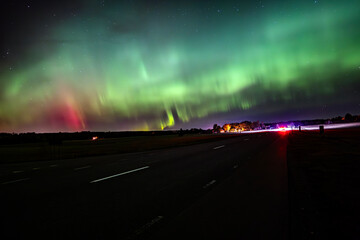 Scenic view of aurora borealis against sky at night