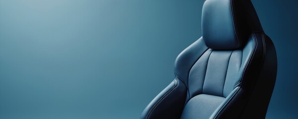 Premium car with perforated leather against a soft blue backdrop. Automotive interior design focuses on comfort and elegance. Stylish seating offers a luxury travel experience with modern details.