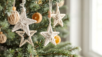 Christmas tree decorated with handmade macrame stars and dried orange ornaments