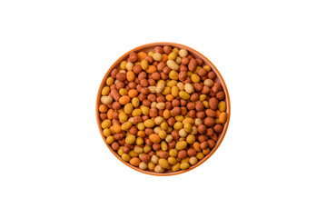 Food, nuts coated with salt and paprika, peanuts as a source of protein. Salted peanuts