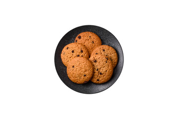 Food, oatmeal chocolate raisin cookies, dessert or breakfast pastry. Oatmeal chocolate cookies